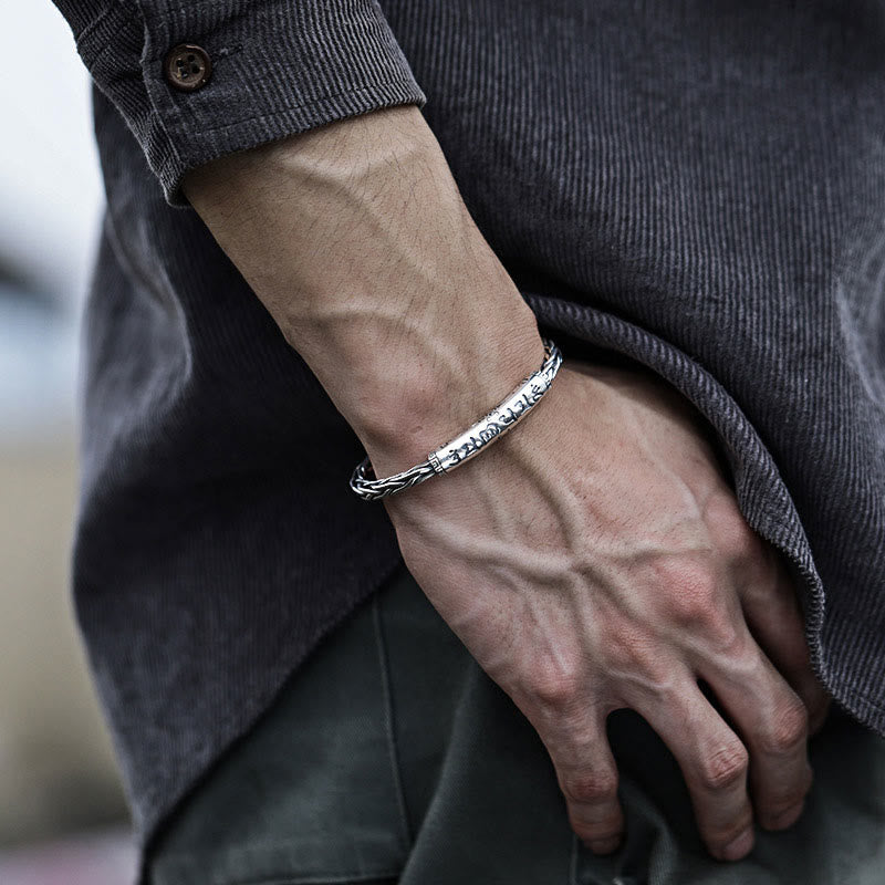 Tibetan Om Mani Padme Hum Engraved Copper Cuff Bangle – Side view on wrist with dark shirt, men's cuff bracelet