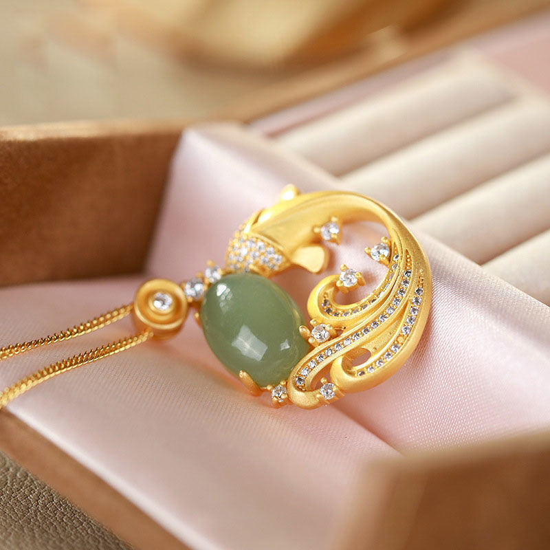 Cyan Jade Koi Fish Healing Necklace Pendant – necklace on display stand, elegant calm luck accessory
