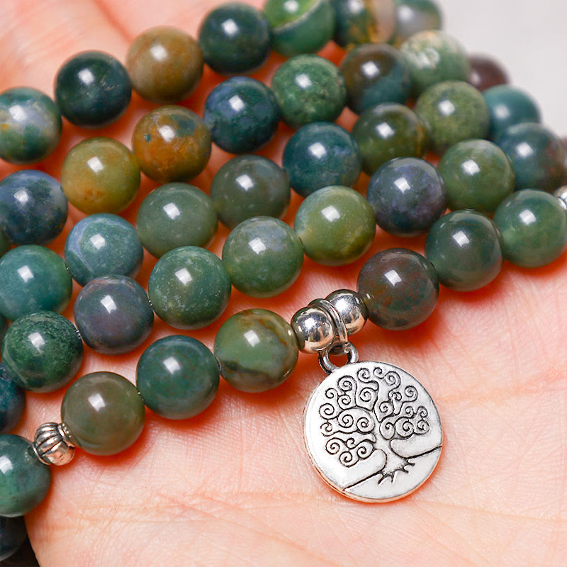 108 Mala Indian Agate Bracelet – agate mala held in hand showing Tree of Life charm scale, natural stone jewelry