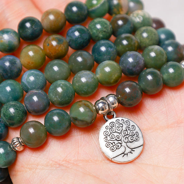 108 Mala Indian Agate Bracelet – agate mala held in hand showing Tree of Life charm scale, natural stone jewelry