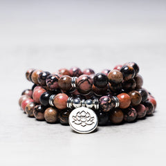 108 Mala Beads Rhodonite Lotus Bracelet – Stacked pink stone coils with lotus pendant focus, emotional healing