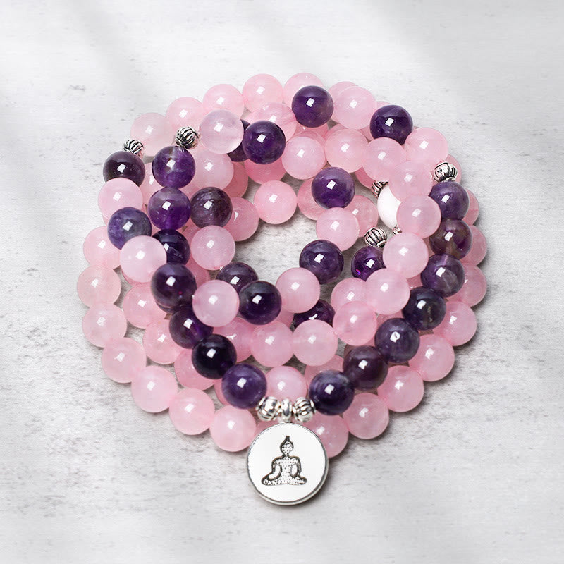 Rose Quartz Amethyst Buddha Bracelet – wrapped mala with silver Buddha charm, coiled flatlay
