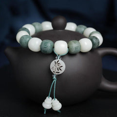 White Bodhi Seed Om Mani Padme Hum Bracelet – On Yixing teapot with lotus pendant, bodhi bead mala