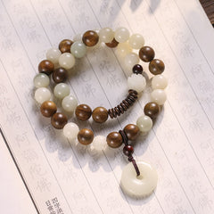 Bodhi Seed Sandalwood Lotus Bracelet - dual-strand white jade and wood beads on Buddhist sutra paper