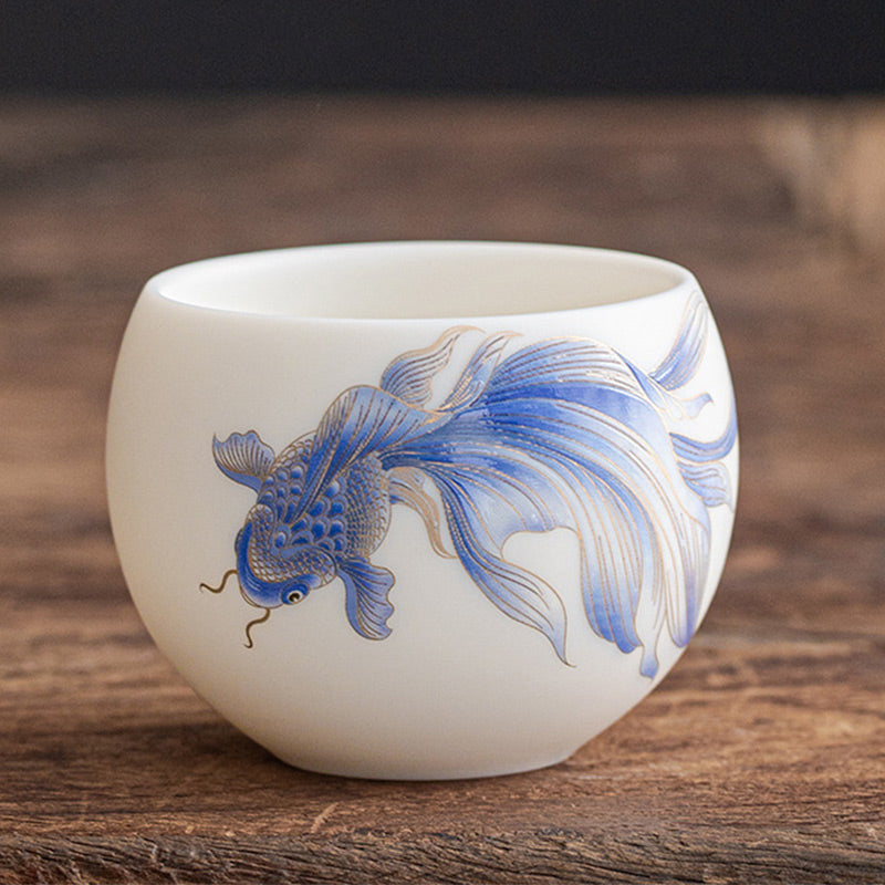 Koi Fish Ceramic Tea Cup - macro shot of fish eye and whisker brushwork detail, hand painted