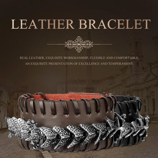 Dragon Leather Weave Protection Bracelet – dual-tone claw-embellished leather cuffs on historic backdrop, striking