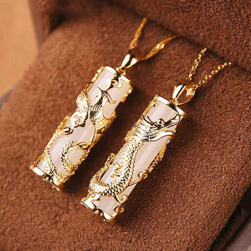Jade Dragon Phoenix Copper Pendant – Twin gold dragon pendants wrapping white jade cylinders, powerful