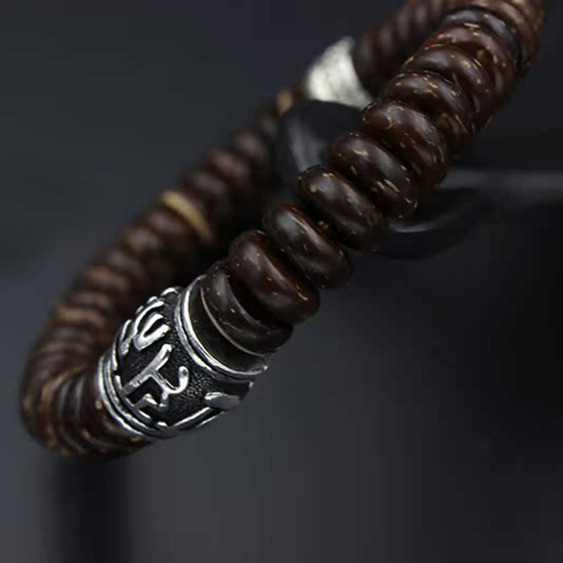 Om Mani Padme Hum Coconut Shell Bracelet – 45-degree close-up, silver engraved charm
