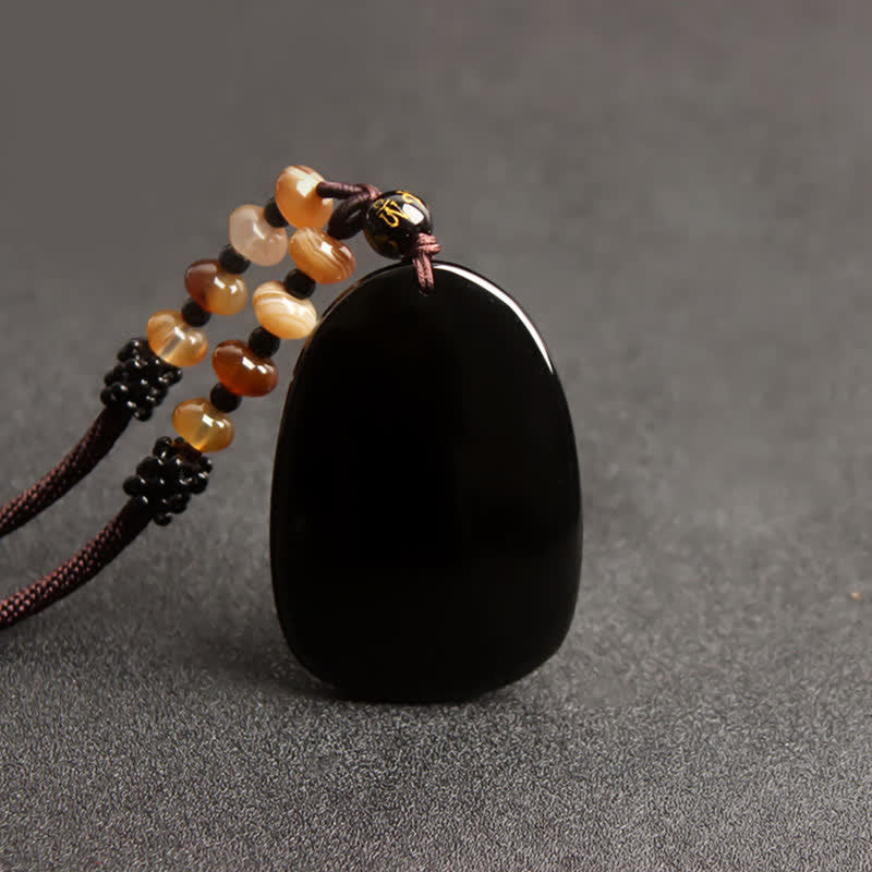 Black Obsidian Tiger Eye Dragon Phoenix Necklace – smooth black obsidian pendant with amber beads, grounding