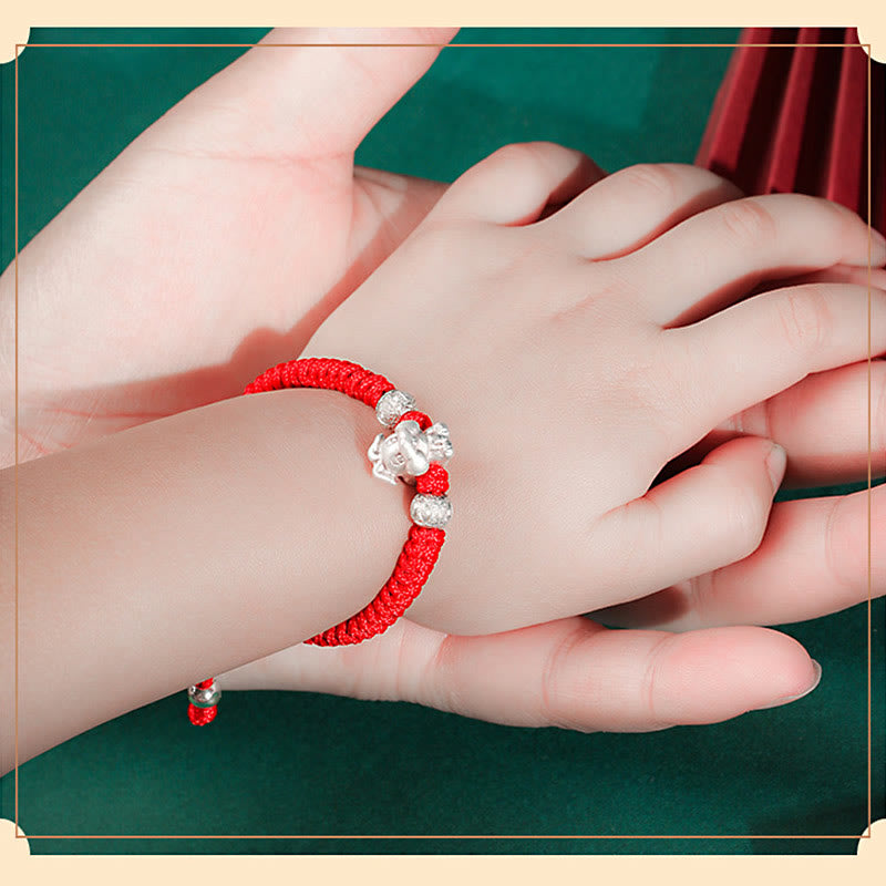 999 Sterling Silver Zodiac Red Rope Kids Bracelet - Silver snake charm on red woven cord with textured beads, zodiac amulet