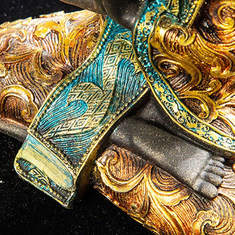 Buddha FengShui Resin Decoration – Detail of gold turquoise robe patterns, macro texture