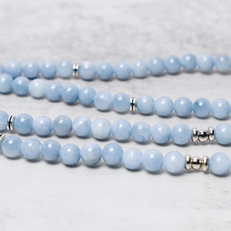 Aquamarine Healing Bracelet – parallel blue strands with silver spacers, tranquil