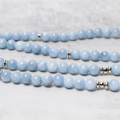 Aquamarine Healing Bracelet – parallel blue strands with silver spacers, tranquil