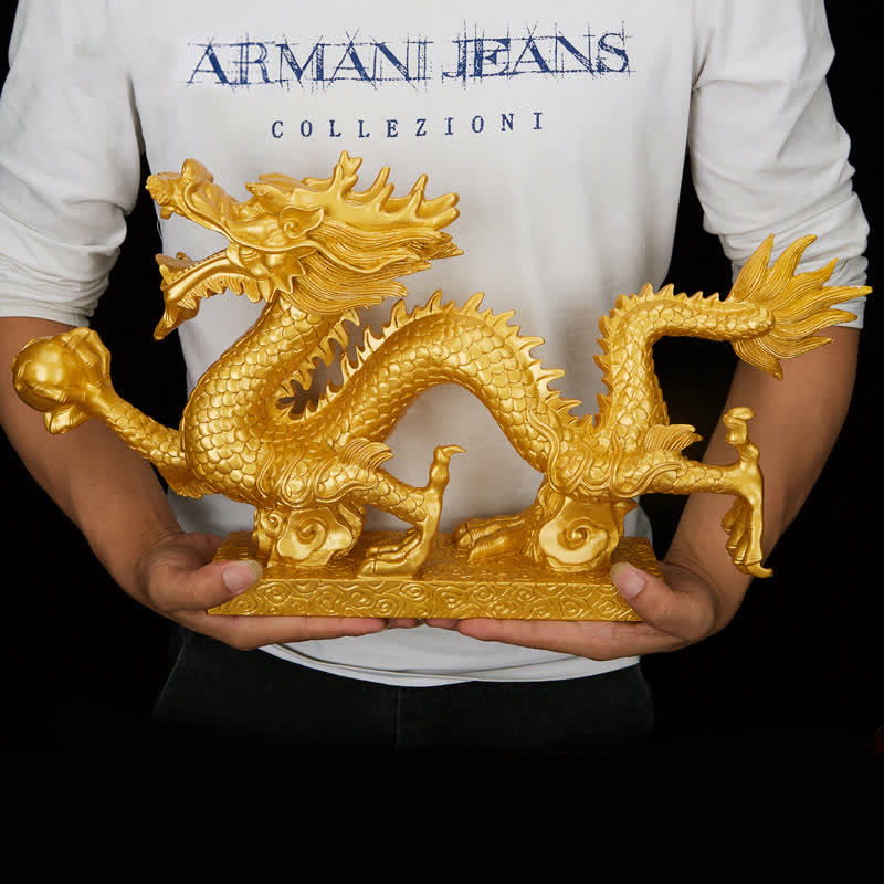 Dragon Auspicious Decor - held against black backdrop gold finish large, striking