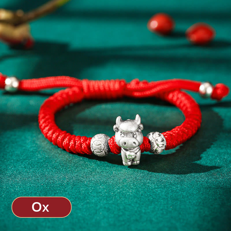 999 Sterling Silver Zodiac Red Rope Kids Bracelet - Silver ox figure on red braided cord with embossed beads, zodiac keepsake