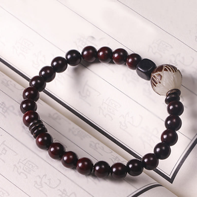 Red Sandalwood Lotus Bodhi Seed Bracelet – Red sandalwood beads with lotus focal on calligraphy manuscript, bronze accents