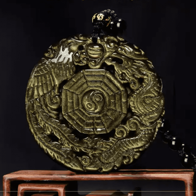 Golden Obsidian Pendant Necklace – Dragon Phoenix Bagua carving on black backdrop, obsidian jewelry