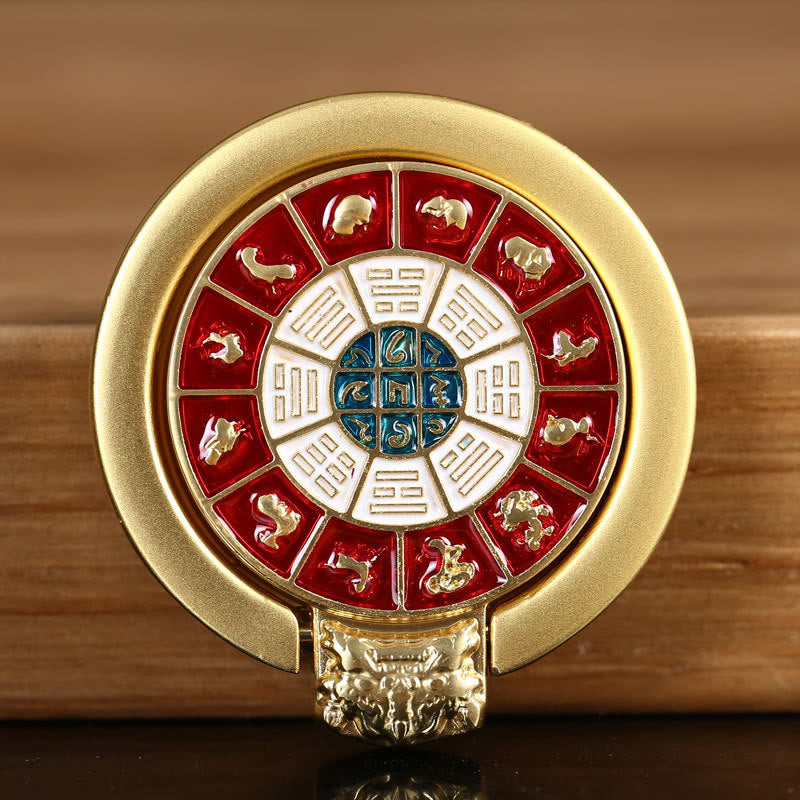 Om Mani Padme Hum Phone Ring Holder – Gold zodiac medallion with lion-head ring holder, spiritual decor