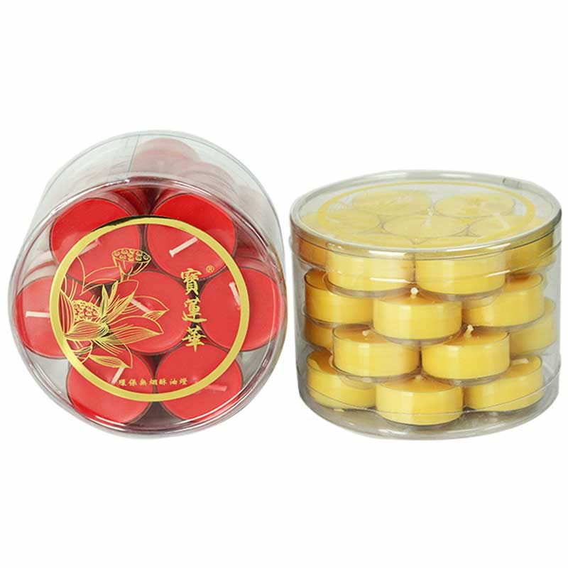 Lotus Candle Holder – Red and yellow Buddhist candles in clear containers, lotus labels, peace