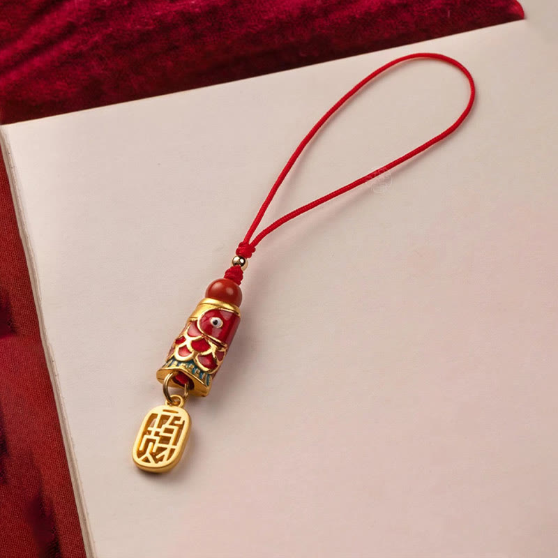 Koi Fish Cinnabar Ruyi Phone Charm – side view of layered red cinnabar koi and ruyi pendants on braided string