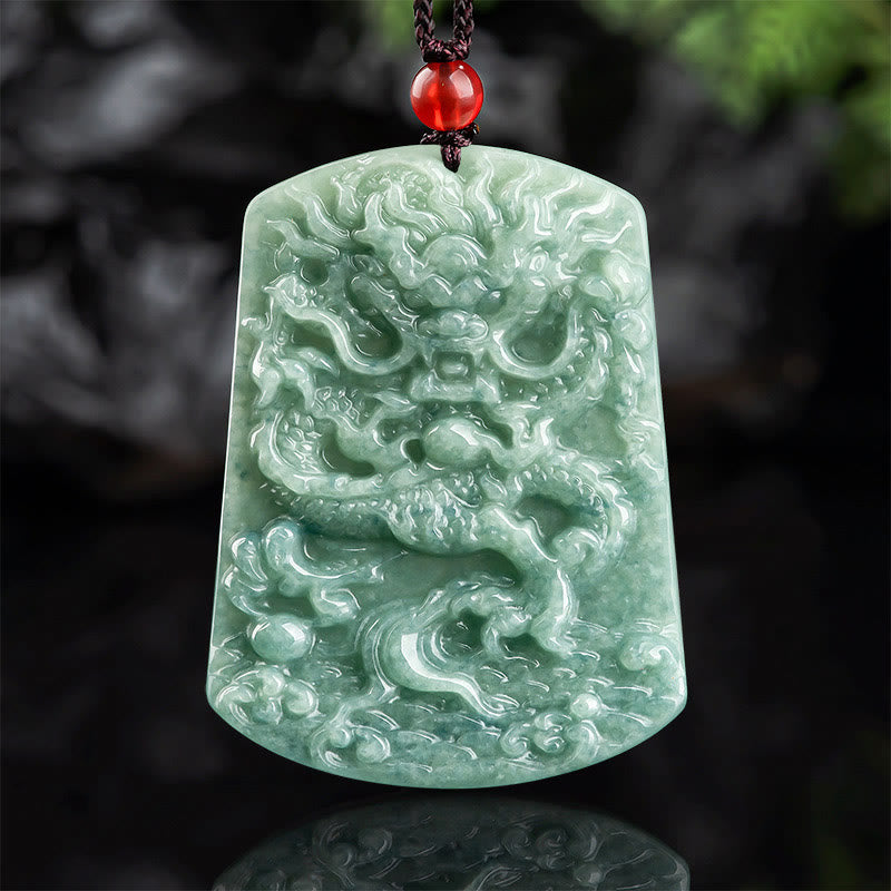 Natural Jade Dragon Pendant – Green jade dragon carved plaque with red bead on dark stone, Artisan relief