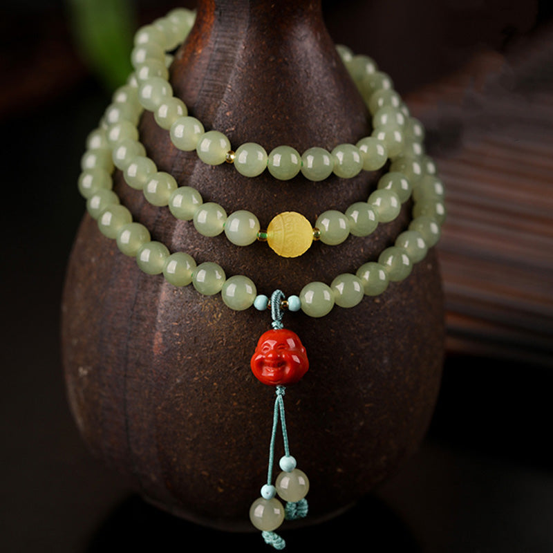 Jade Red Agate Buddha Bracelet - Natural daylight showing stone translucency, agate crystal jewelry