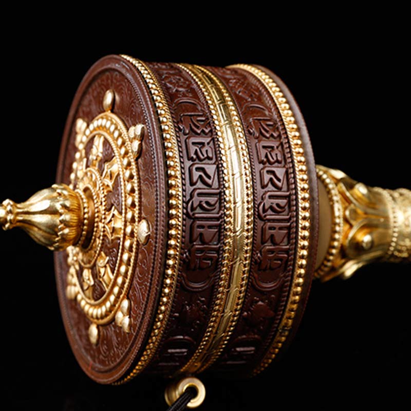Copper Prayer Wheel – Close-up of cylindrical body with dharma wheel face, Buddhist meditation