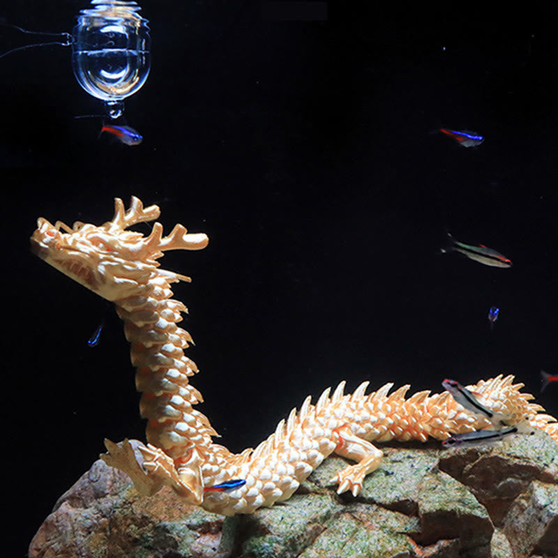 Feng Shui 3D Dragon - Pearlescent ivory dragon draped over aquarium rock with neon tetras, luminous