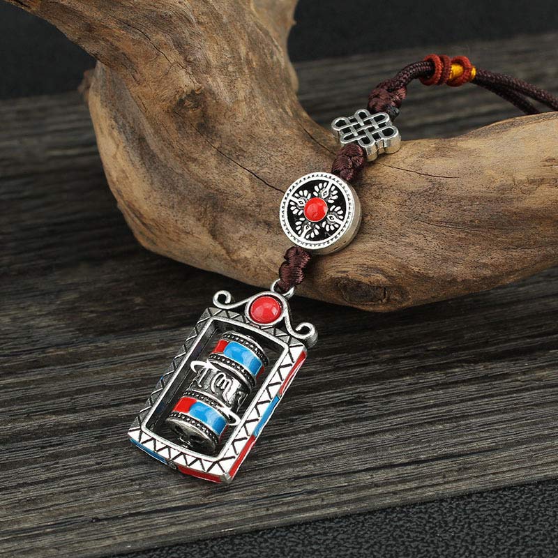 Om Mani Padme Hum Prayer Wheel Keychain – Diagonal view on driftwood, rotating mantra wheel with turquoise, Tibetan keychain Imagen principal del producto