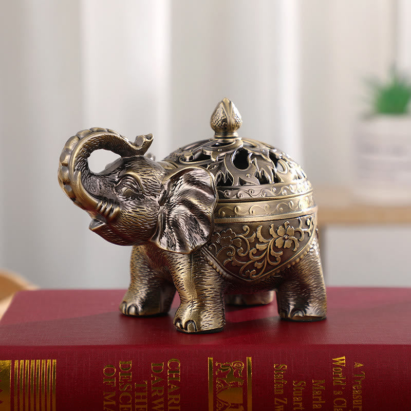 Elephant Alloy Incense Burner – resting on vintage book, Lucky