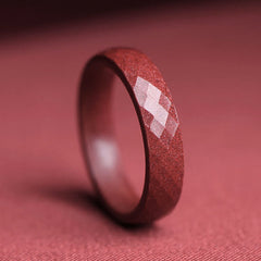 Cinnabar Om Mani Padme Hum Blessing Ring – terracotta cinnabar ring with silver geometric zigzag inlay, matte finish, side angle shot