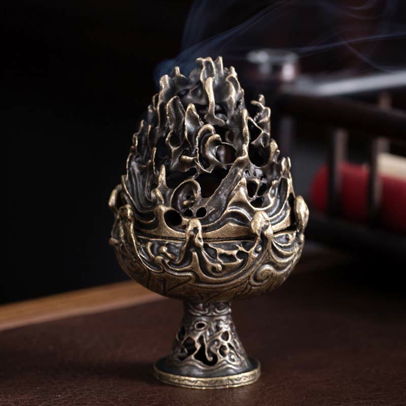 Mountain Incense Burner Lifestyle – Low angle on dark wood with traditional interior bokeh, smoke through ornate peaks