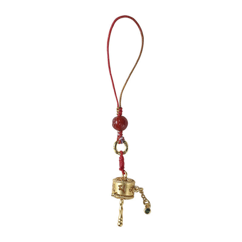 Prayer Wheel Phone Charm – Straight-on frontal view on pure white, gold charm