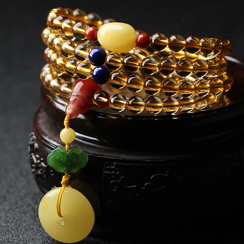 Citrine Mala Bracelet – 108 citrine beads with amber peace buckle, red agate and green jade charm