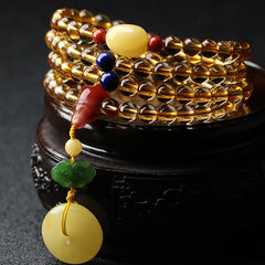 Citrine Mala Bracelet – 108 citrine beads with amber peace buckle, red agate and green jade charm