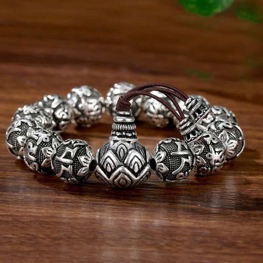 Om Mani Padme Hum Bracelet – Single silver mantra bracelet on wood, lotus guru bead