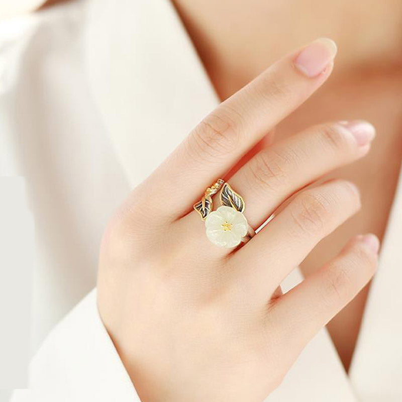 White Jade Plum Blossom Silver Ring - Ring worn with coiled vine detail, textured flower petals, gold and dark patina leaf accents on hand