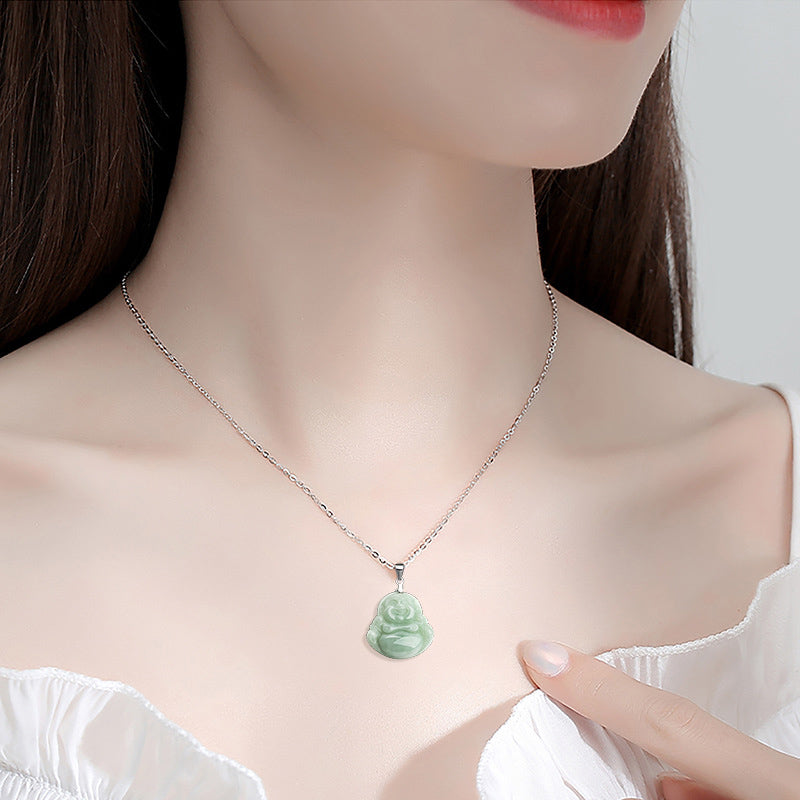 Jade Laughing Buddha Blessing Necklace – pendant worn on model neckline, white off-shoulder top, lifestyle