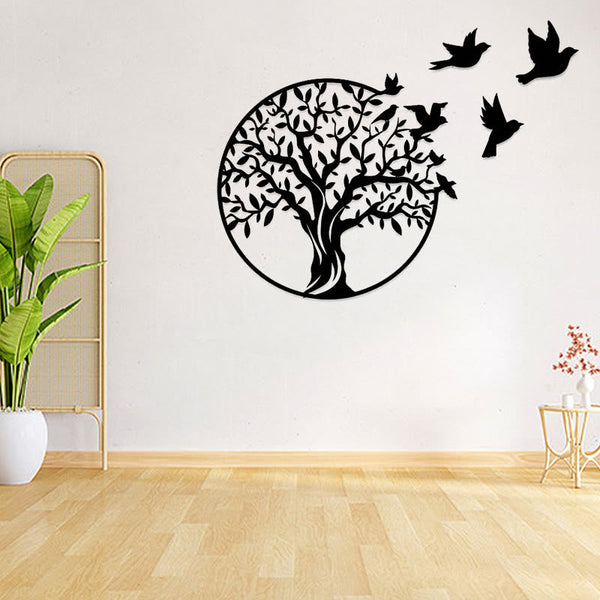 Tree of Life Birds Metal Wall Art - black tree with birds on white wall beside tall plant and bamboo screen