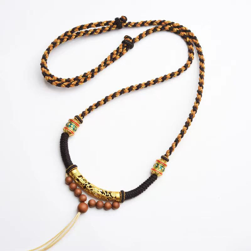 Tibetan King Kong Knot Prayer Wheel Necklace – full view on white background with tassel, prayer necklace