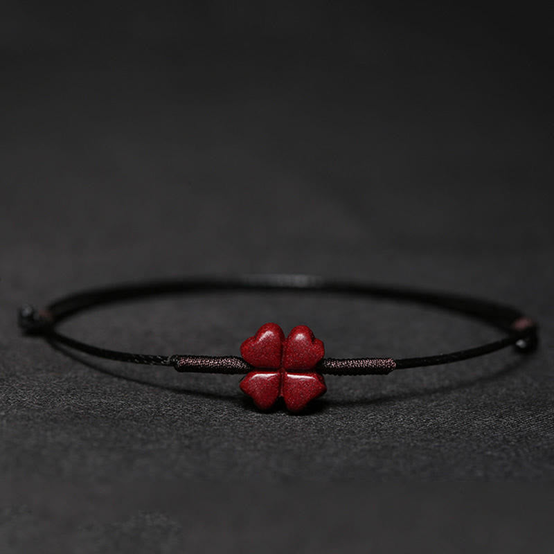 Cinnabar PiXiu Lotus Koi Fish Blessing Braid Bracelet – four-leaf clover on black cord, minimalist unisex luck protection accessory