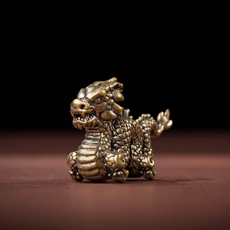 Auspicious Brass Dragon Decoration - Guardian beast figurine on wooden surface, bold protection symbolism