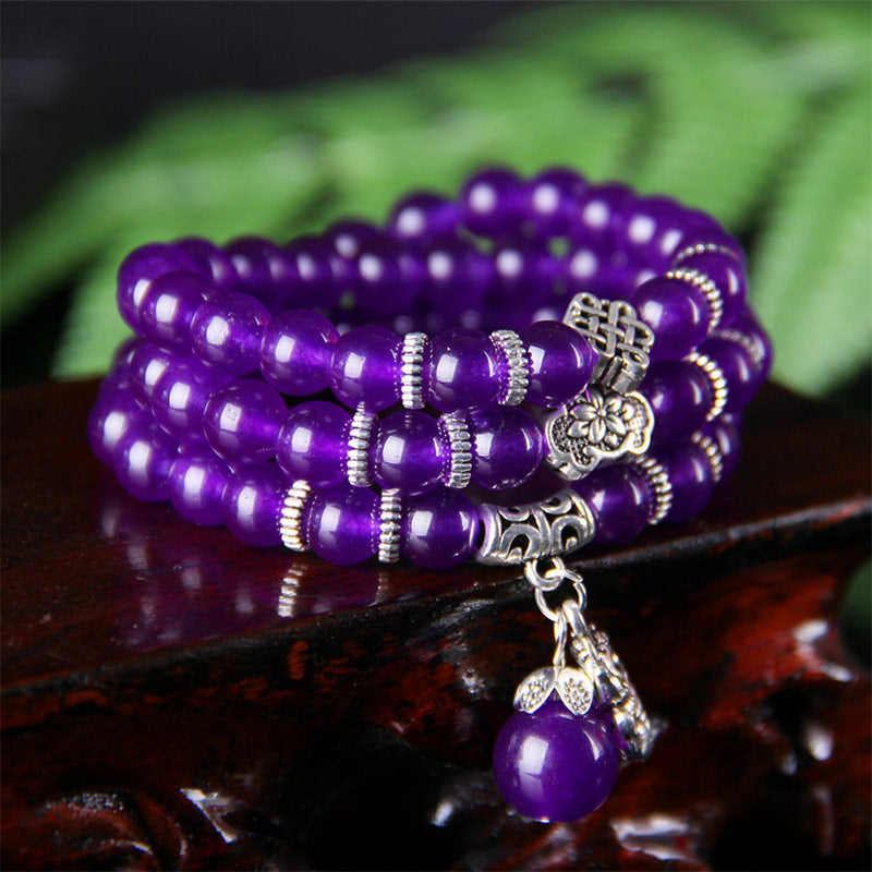 Amethyst PiXiu Bracelet – Multi-wrap purple beads with silver PiXiu on dark wood
