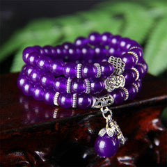 Amethyst PiXiu Bracelet – Multi-wrap purple beads with silver PiXiu on dark wood