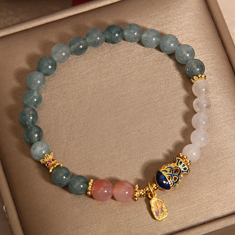 Jade Agate Koi Scripture Bracelet – close-up of carved koi fish bead with scripture ring detail
