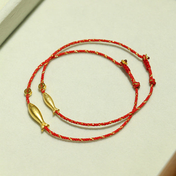 14K Gold Plated Koi Braided Bracelet – close-up of gold-plated koi fish charm with detailed scales on woven cord