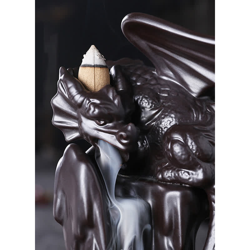 Nordic Dragon Backflow Incense Burner close-up dragon head with backflow cone, smoke from mouth, dark ceramic dragon