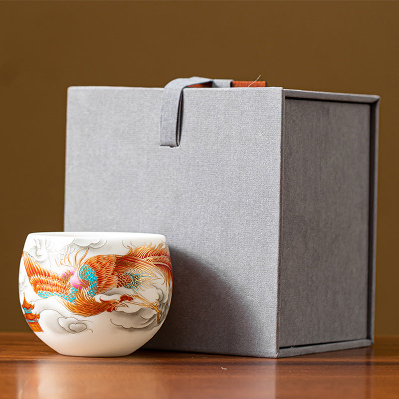Dragon Phoenix Clouds Ceramic Teacup Gift Set – Phoenix in orange-red and gold with teal feathers amid gray clouds