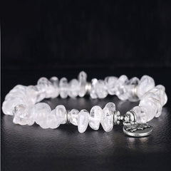 Natural White Crystal Lotus Bracelet – Shallow depth macro of raw chip beads, crystal healing