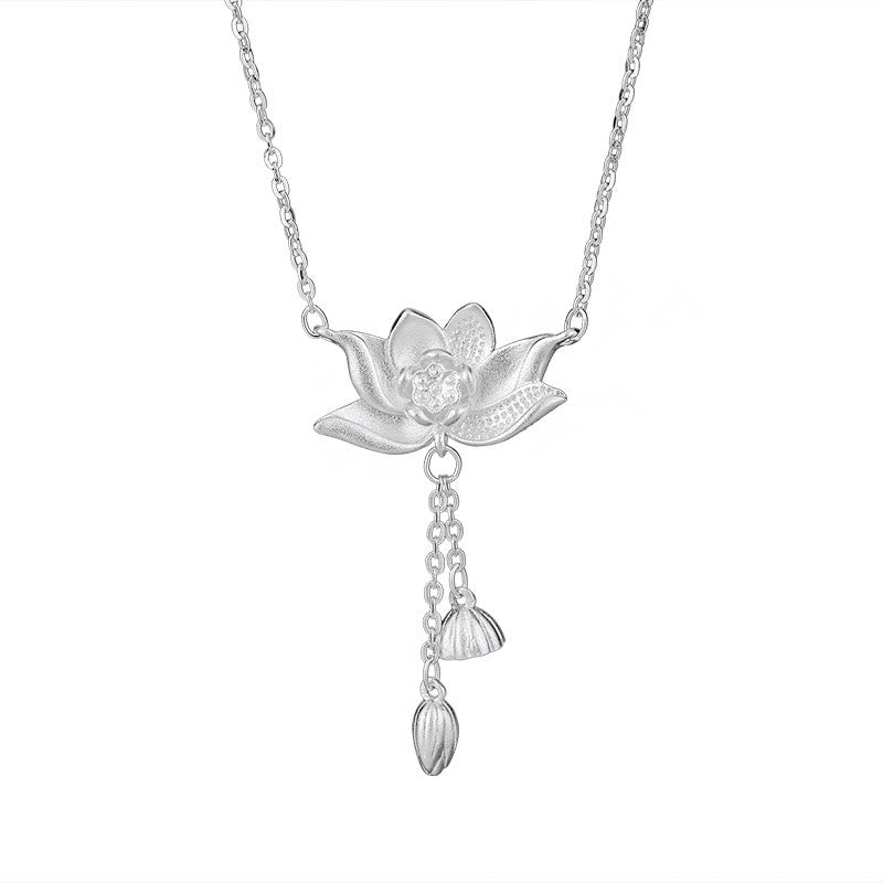 999 Silver Lotus Pod Necklace – Layered lotus petals and bud drops on white background, fine silver necklace
